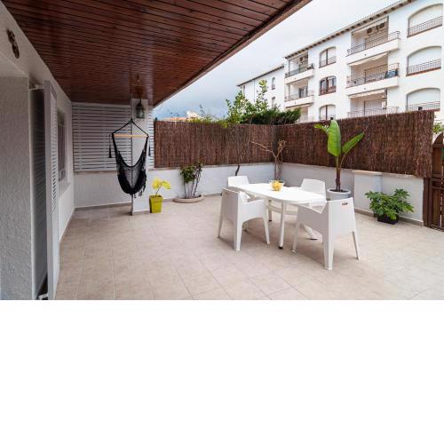 Near beaches large private patio, aircon & community pool