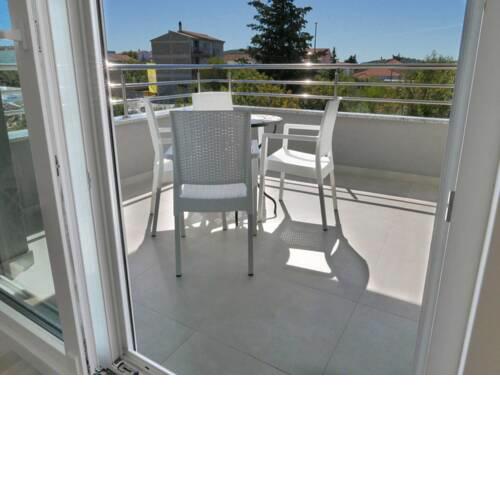 New modern apartment with private terrace near the beach
