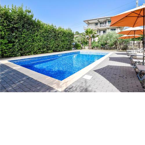 Nice apartment in Santa Venerina with Outdoor swimming pool, WiFi and 3 Bedrooms