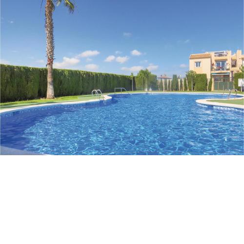 Nice Apartment In Torrevieja With Wifi, Outdoor Swimming Pool And Swimming Pool