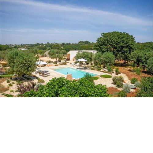 Nice home in Cisternino with Outdoor swimming pool, WiFi and 4 Bedrooms
