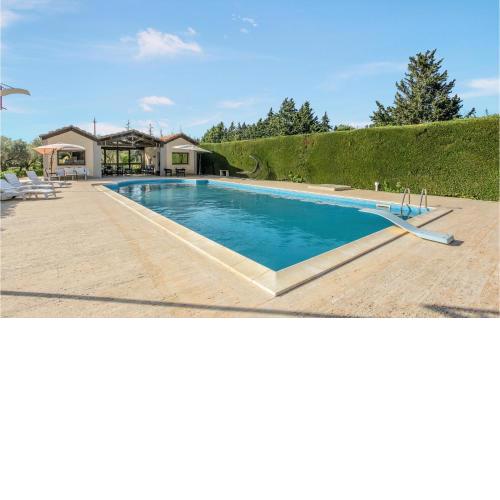 Nice home in Comiso with Outdoor swimming pool, WiFi and 3 Bedrooms