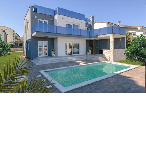 Nice home in Liznjan with WiFi, Outdoor swimming pool and 5 Bedrooms