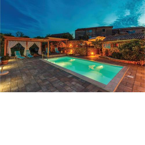 Nice home in Malinska with Outdoor swimming pool, WiFi and 3 Bedrooms