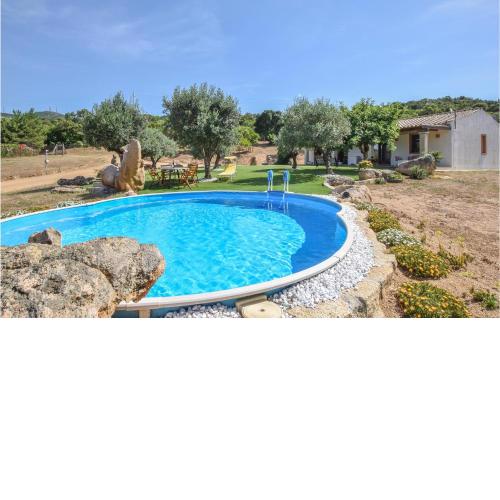 Nice home in Olbia with Outdoor swimming pool, WiFi and 3 Bedrooms