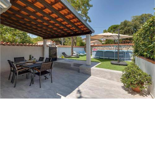 Nice home in Porec with WiFi, Outdoor swimming pool and 2 Bedrooms