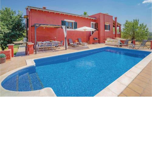 Nice Home In Port Dalcdia With 3 Bedrooms, Wifi And Swimming Pool