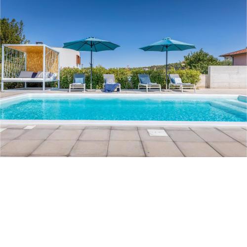 Nice home in Pula with Outdoor swimming pool and 3 Bedrooms