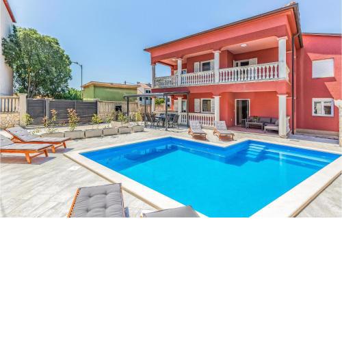 Nice home in Pula with Outdoor swimming pool, WiFi and 3 Bedrooms