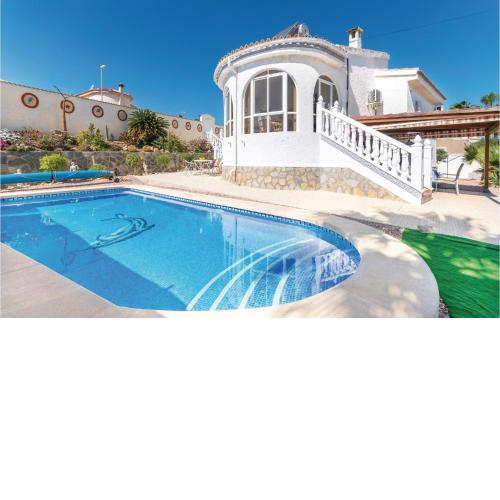 Nice home in Rojales with 4 Bedrooms, Internet and Outdoor swimming pool