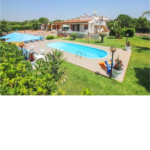 Nice home in SIRACUSA with 2 Bedrooms, WiFi and Outdoor swimming pool