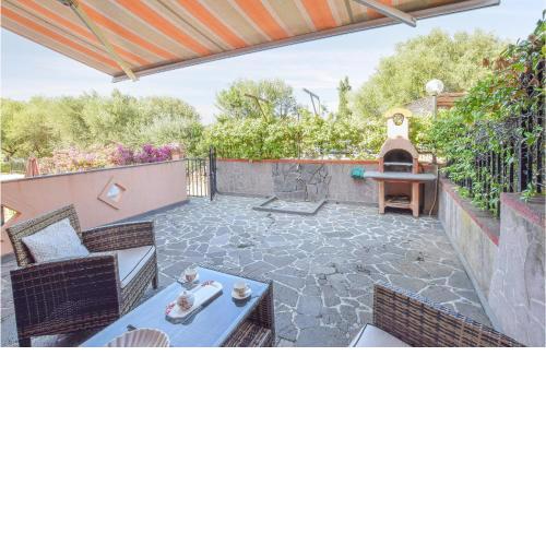 Nice home in Tanuanella Budoni with 2 Bedrooms