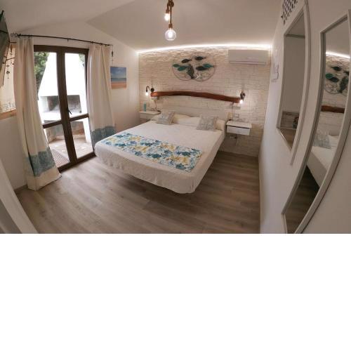 Oasi del Relax - Seaside Peaceful Panoramic Terrace in ITALY Sardinia 50 mt beach&sea full comfort air conditioning-WiFi-Netflix-Parking-Privacy LAST MINUTE OCTOBER