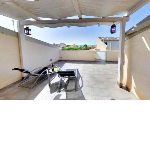 One bedroom appartement at Punta Secca 100 m away from the beach with sea view terrace and wifi