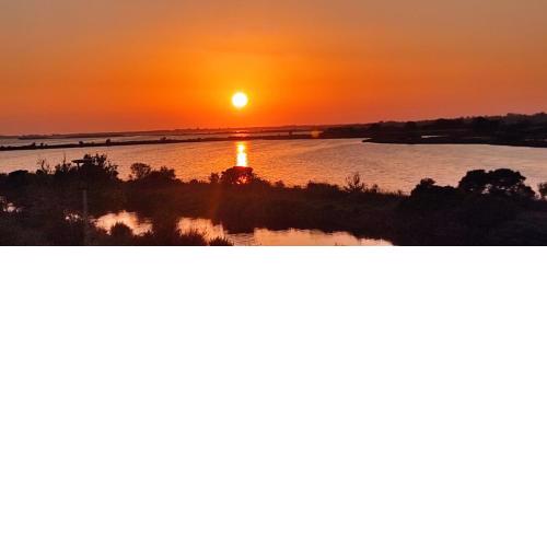 [orbetello] sunset over the lagoon + free parking