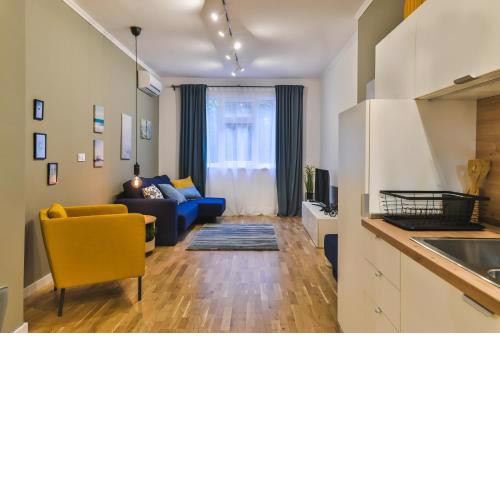 Pieces of Nature in a Stylish One-bedroom Flat