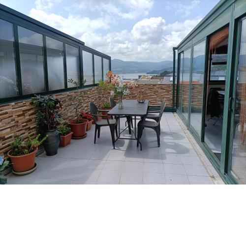 Piso con terraza en las Rías Altas