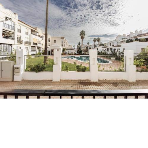 Piso de playa con piscinas