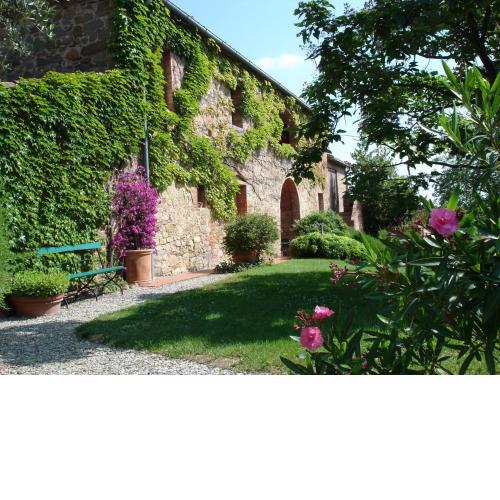 Podere L'Erbolario, stylish villa with private pool and olive garden.