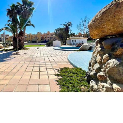 Premium apartment with communal pool in front of Roquetas beach