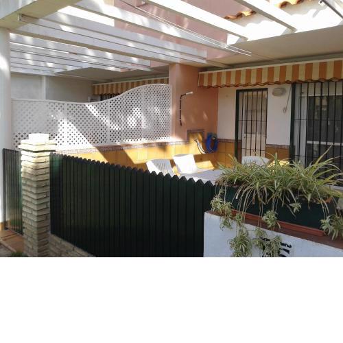 Primera línea de playa casita adosada