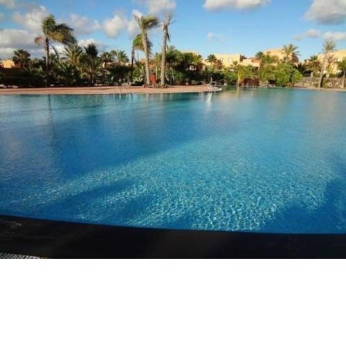 Private Ferienwohnung in Corralejo mit Terrasse, gemeinschaftlichem Pool und Garten