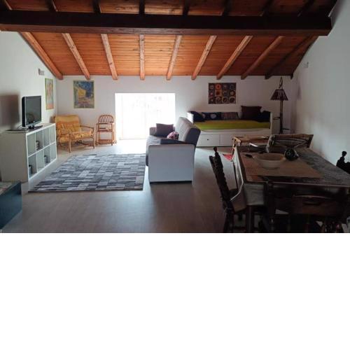 Puzzle House, mansarda di 130mq con open space al centro storico