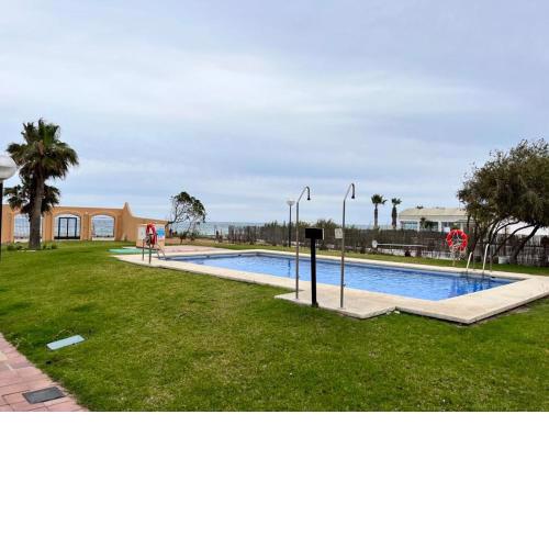 RA582 1ª línea naturista bajo 2 dormitorios