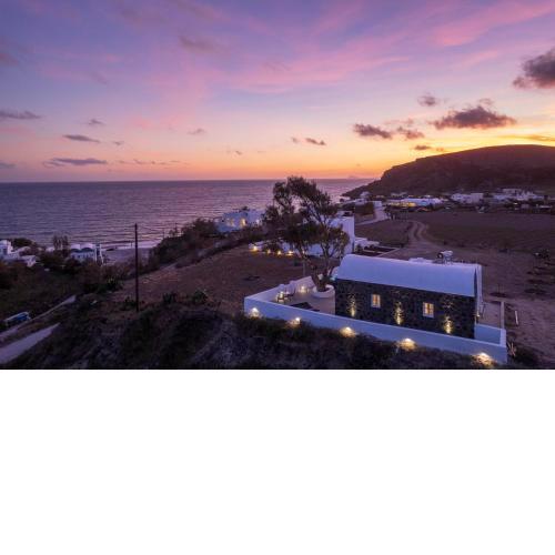 Red beach Harmony Suites Stone house