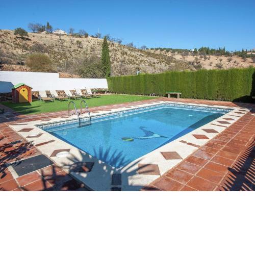 Roofed Cottage in Andalusia with fantastic pool and garden