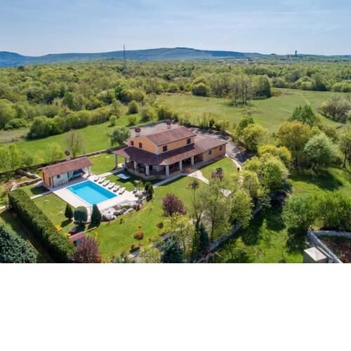 Rustically furnished villa with swimming pool and spacious yard near Labin