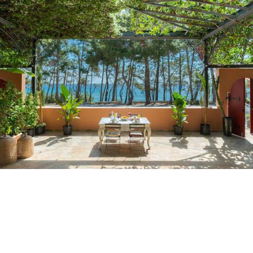 Scorpios Mansion / Downtown Skala / Seaside