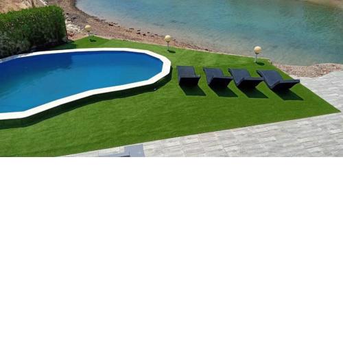 Sea front unique white villa
