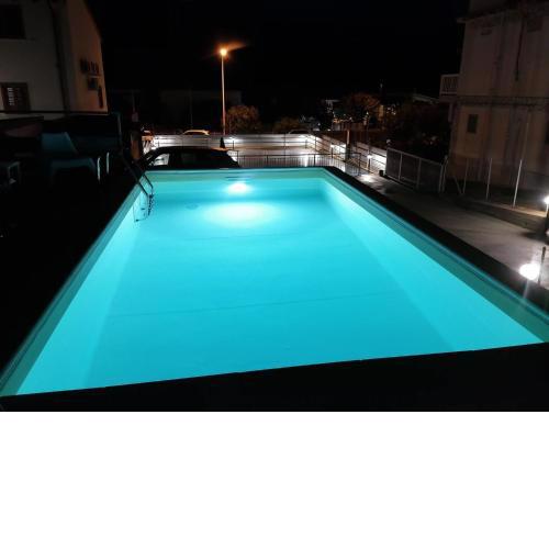 Seafront Apartment in Villa with Swimming Pool and Parking