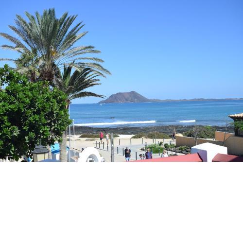Seafront Villa Aire with Private Pool, BBQ, Fiber Optic Wifi- In The Heart of Corralejo by Amazzzing Travel