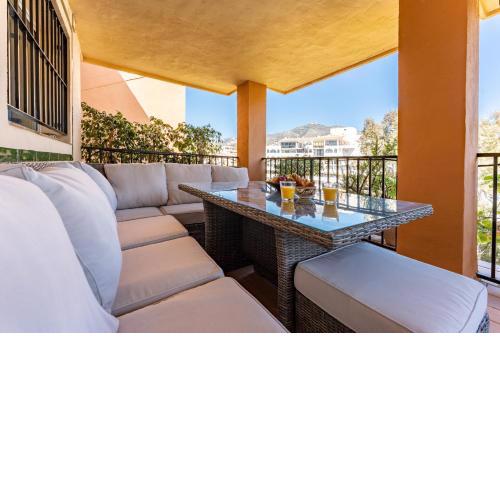 Seaside Bliss 2BR Apartment with Tranquil Terrace Pool and Parking