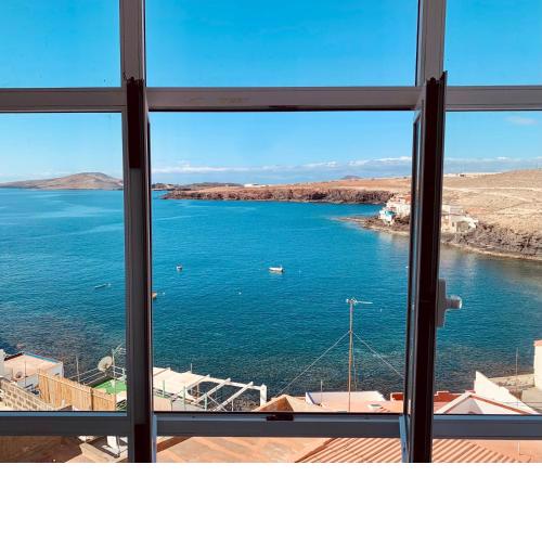 Seaview - ocean view - beachfront - modern- cozy - mountain view - Netflix & Wi-Fi - modern- cozy - Gran Canaria Airport LPA