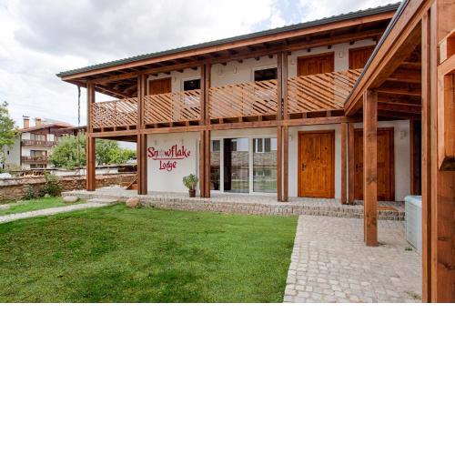 Къщи за гости Сноуфлейк Snowflake Chalet and Snowflake Lodge
