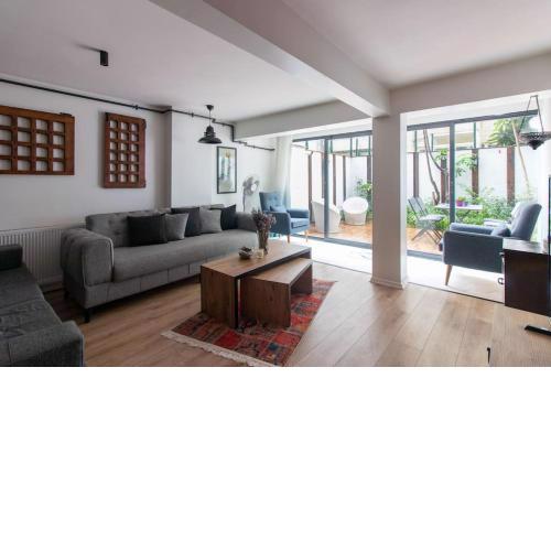 Sophisticatedly Furnished 2BR + 2BA Flat w/ Patio
