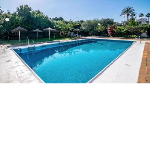 Sotogrande Duplex near Polo, 2 terraces, 2 pools, full south, 7' drive to beaches and Port, 4 people