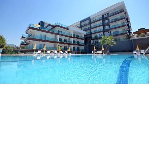 Spacious Flat at the Beach Pool, huge Balcony, 2 Bedroom