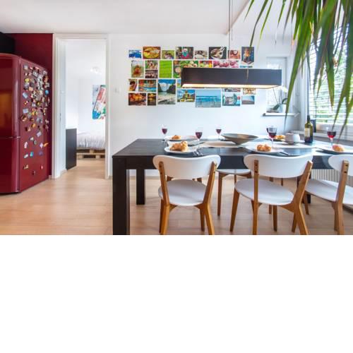 Spacious Riverbank Apartment With a Balcony and a Garage