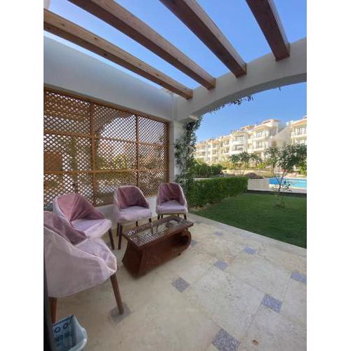 Studio on the ground floor in Sharm Hills Resort with private garden and pool view