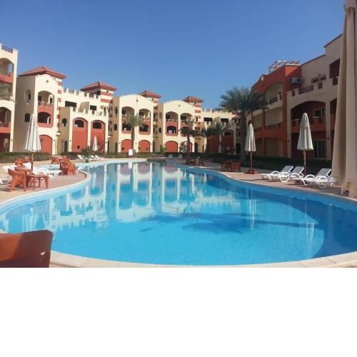 Studio with balcony & pool view in La Sirena Resort