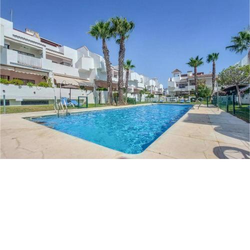 Stunning Apartment In Islantilla With Outdoor Swimming Pool, Wifi And 2 Bedrooms