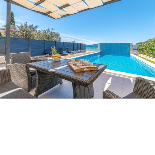Stunning home in Sibenik - Zaboric with Outdoor swimming pool, WiFi and 3 Bedrooms