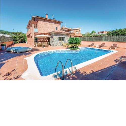 Stunning home in Viladecavalls with 5 Bedrooms, WiFi and Outdoor swimming pool