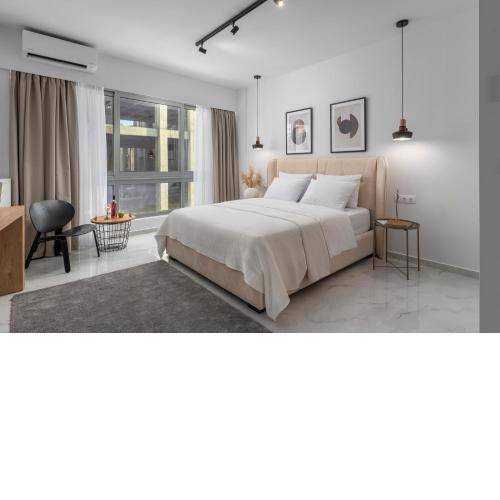 ΙΩΚΑ Suites / the Urbitality Project