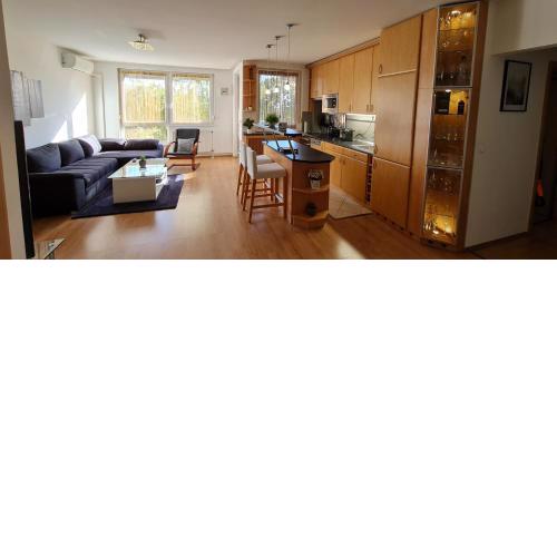 Sun apartment pezsgőfürdővel és zárt parkolóval