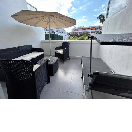 Sunny Apt with terrace coastal area South Arona